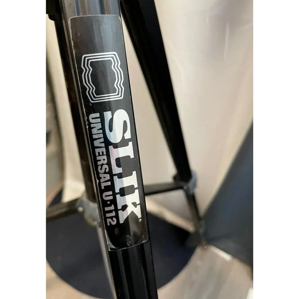 Slik Universal U-112 Tripod extends from 22